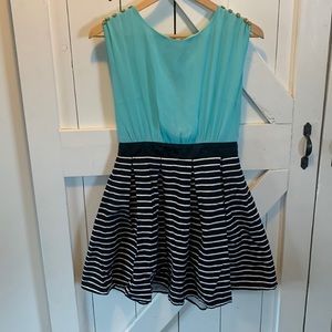 Pleated flared skirt dress.